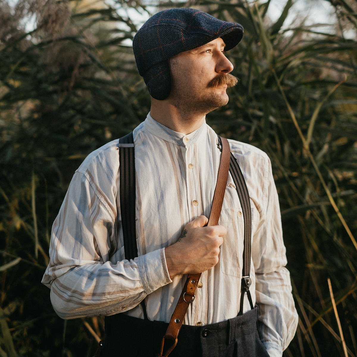 Tweed flat cap store with ear flaps